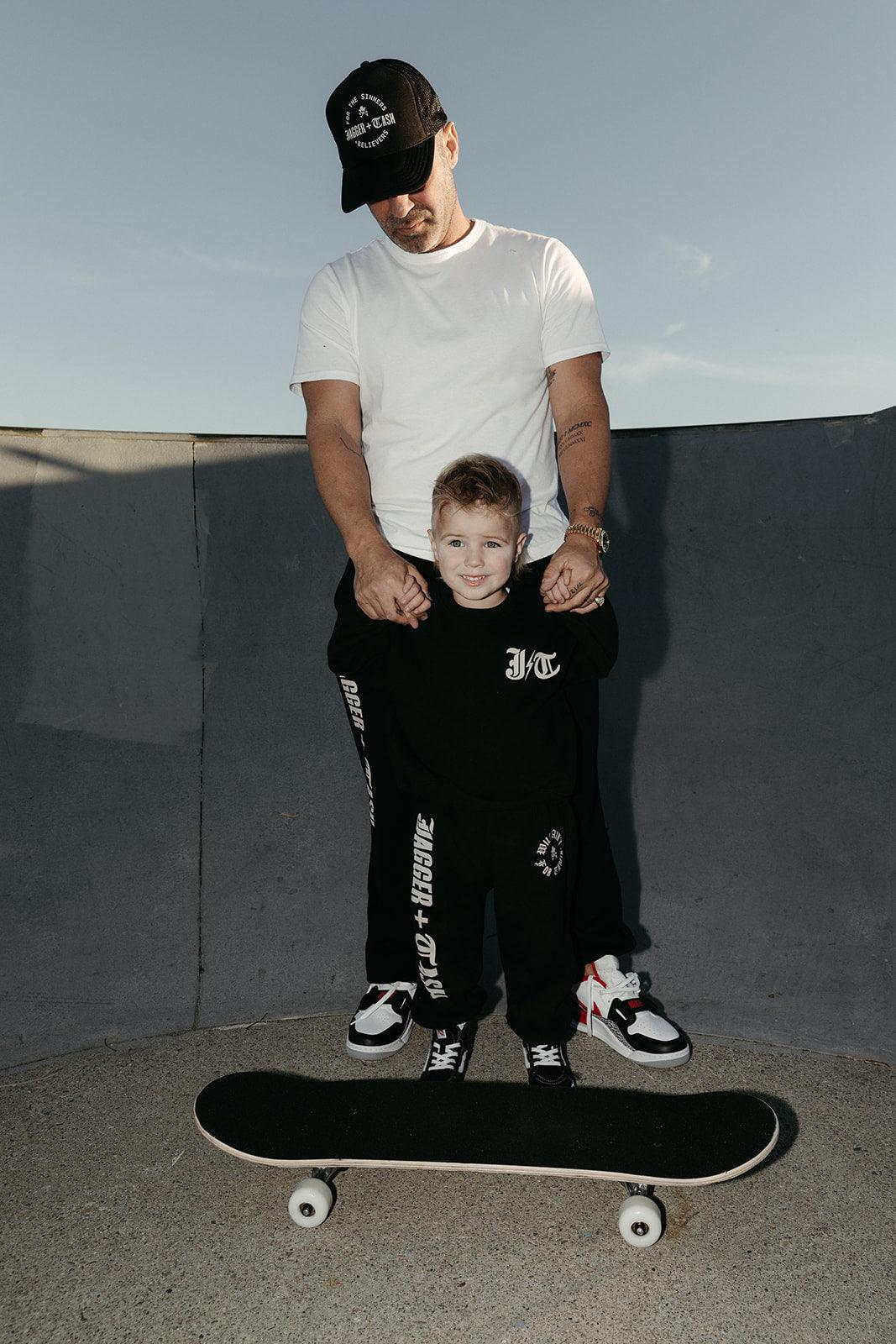 For the Sinners + Believers Adult Trucker Hat Jagger + Cash